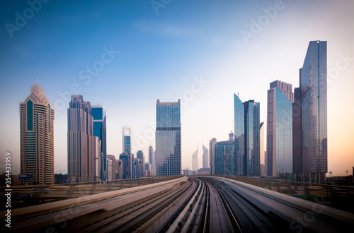 Sheikh Zayed road and metro railway. Sunrise in Dubai.