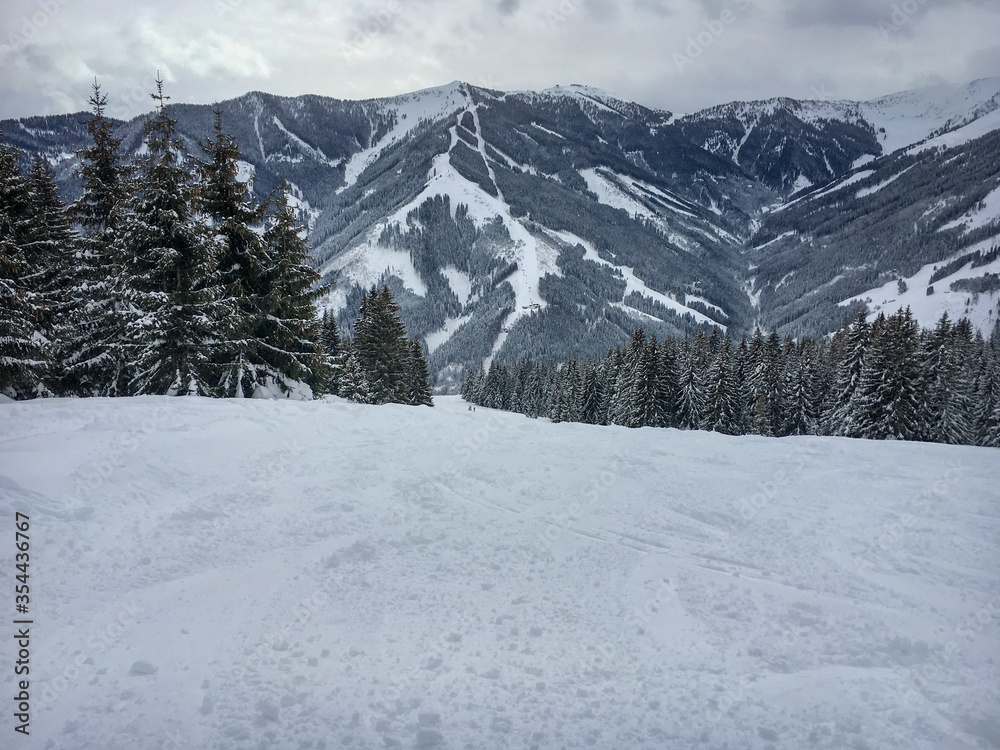 Scenic view from slope of Viehofen ski route in the ski region Saalbach-Hinterglemm.