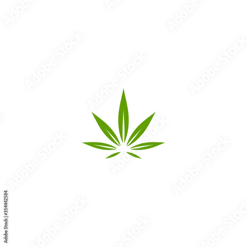 Green hemp or cannabis leaf isolated on white.