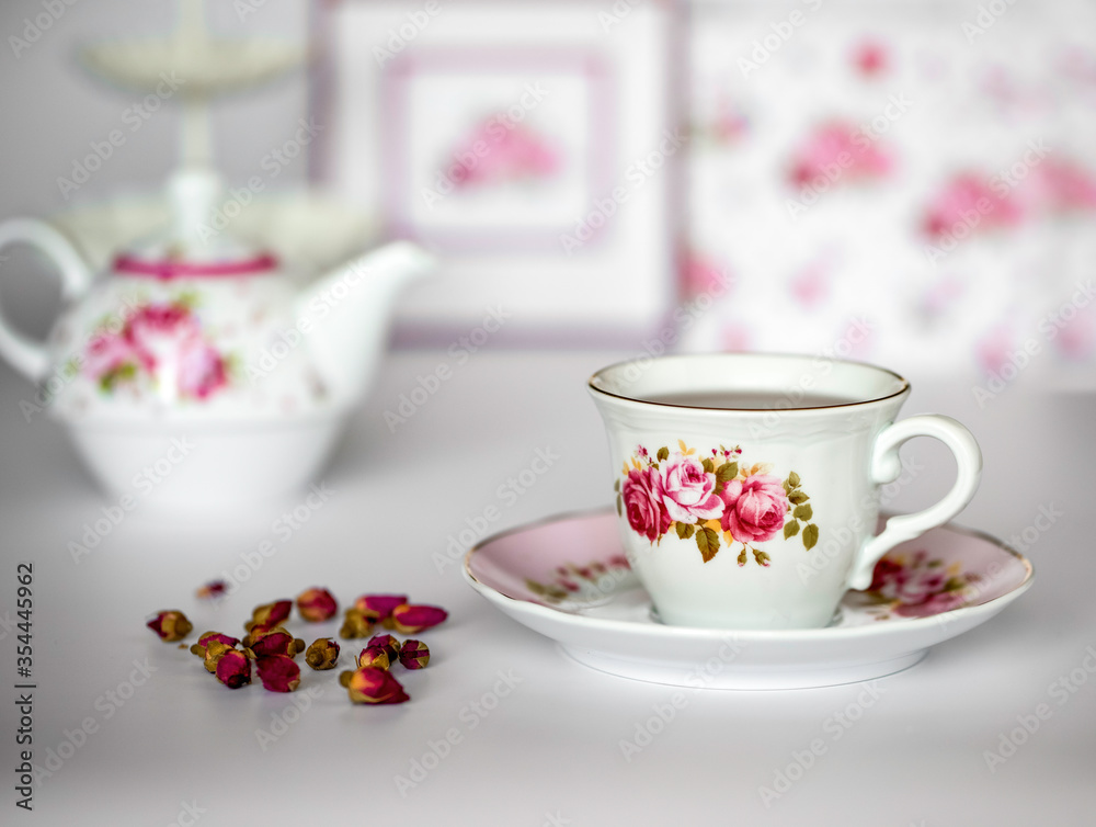Top view of a cup of tea with dried roses Top view of a cup of tea with dried roses