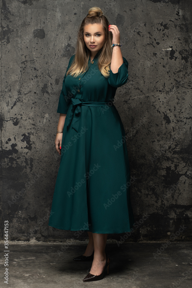 Sensual beautiful blonde woman posing. Girl with long curly hair. Sensual beautiful blonde woman posing. Girl with long curly hair.