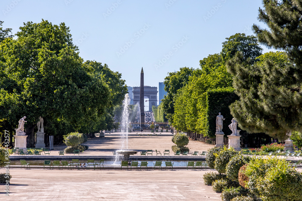 Paris, France - May 29, 2020: View of Place de la Concorde and Arc de Triomphe from Tuileries garden in Paris