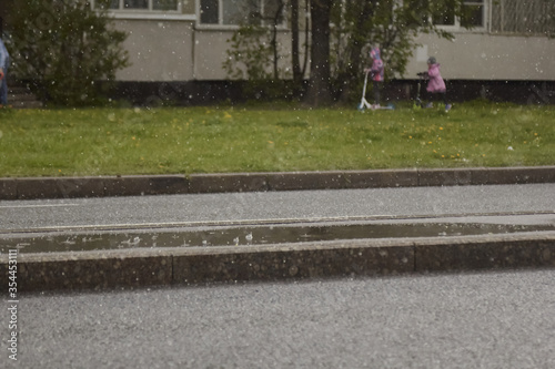 Sudden local hail, sunrise, walkway condition on side street