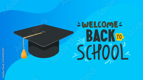 School banner with student hat and text.