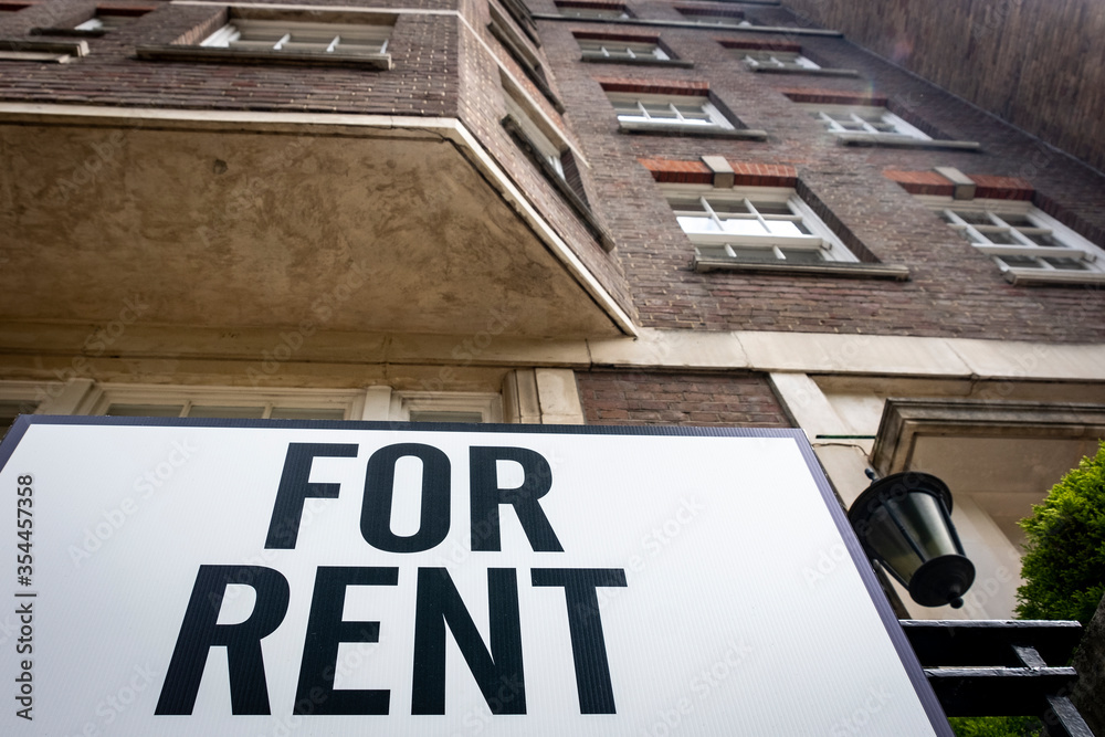 'For Rent' sign outside city building 'For Rent' sign outside city building