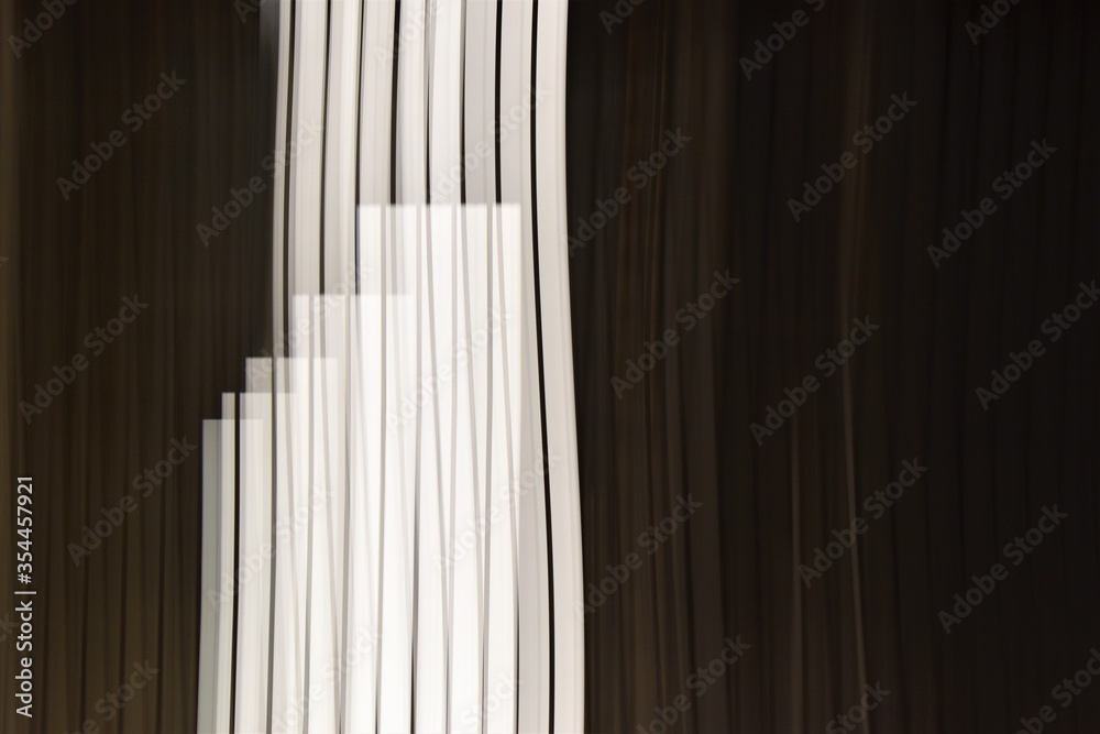 Abstract black and white vertical stripes. Bright lights at night. Abstract black and white vertical stripes. Bright lights at night.