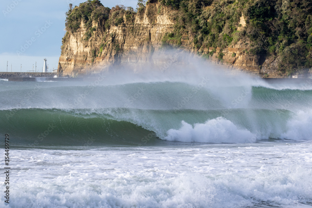 Waves breaking in Japan. The Pacific Ocean & its waves often generated