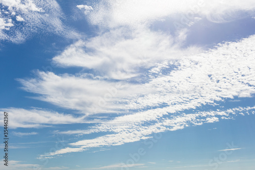 Fototapeta Naklejka Na Ścianę i Meble -  Swirl of white clouds in a blue sky 