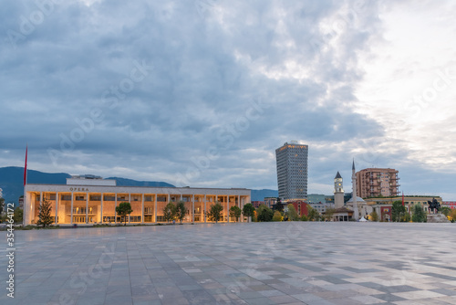 Sunset view of the palace of culture on Skanderbeg square in Tirana, Albania photo