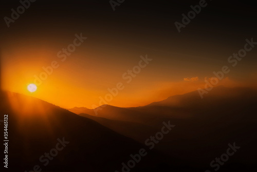 Orange sunset at the Andes of Ecuador mountain range © Ramiro