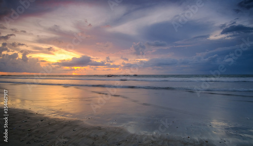 Beautiful Sunset at Bali Beach featuring fisherman boat © yahya