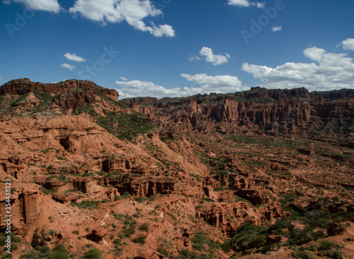Prehistoric Cliffs in Sierra de las Quijadas National Park. Arid desert landscape. Red sandstone, hills, canyon and valley view