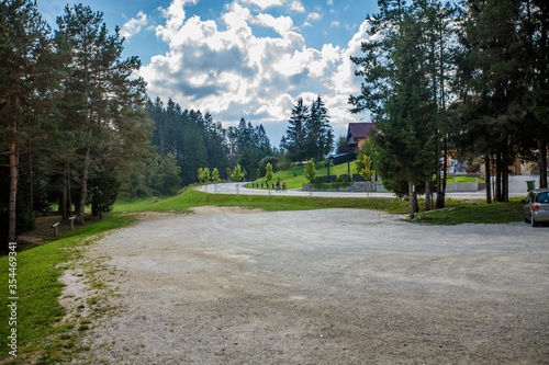 View of the parking lot at a glamping site at Lake Bloke, Nova Vas, Slovenia photo