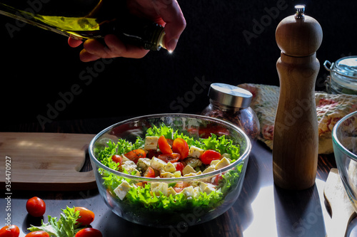 Cooking a salad of fresh vegetables, good nutrition