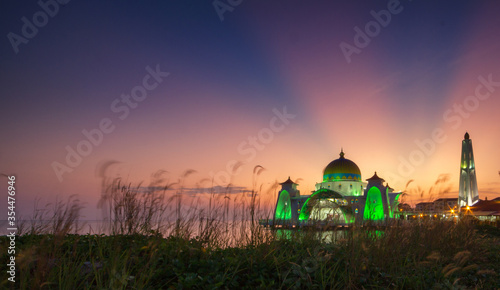 Beautiful Straits Mosque of Malacca during sunset. photo
