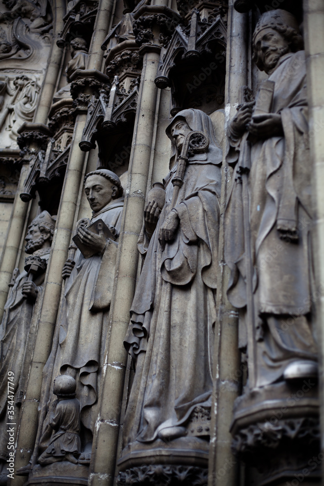 Statues decorate the entrance of cathedral of Our Lady, Antwerp, Belgium