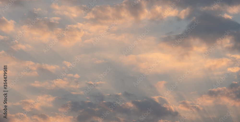 Beautiful sunset sky above clouds with dramatic light
