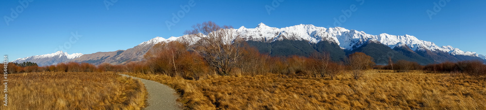 Winter mountain landscape with hiking path. Outdoor mountain landscape