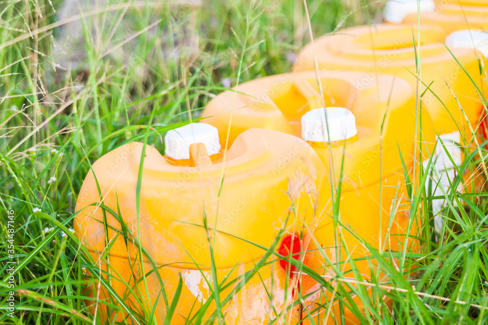 Chemical container view in close up showing irresponsible company