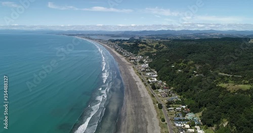 Wallpaper Mural 4k aerial tracking backwards motion above the popular tourist beach of Ohope Beach, known as one of the top beaches on the North Island of New zealand Torontodigital.ca