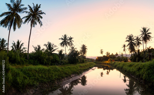 Village river reflection of sunrise view in Balik Pulau, Penang