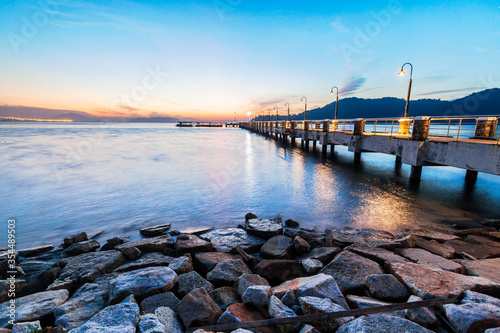 Jerejak Pier view during sunrise by the shore of Bayan Mutiara