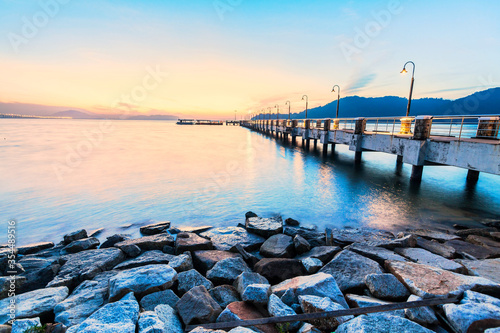 Jerejak Pier view during sunrise by the shore of Bayan Mutiara © keongdagreat