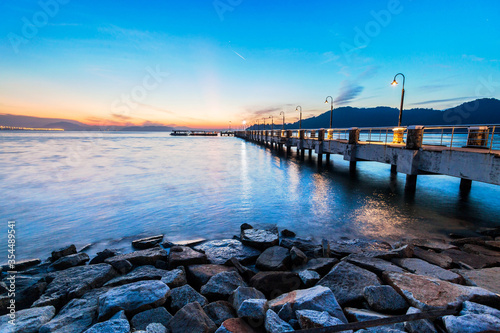 Jerejak Pier view during sunrise by the shore of Bayan Mutiara