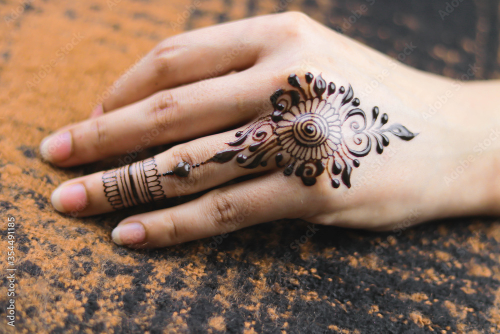 Premium Photo | Popular mehndi designs for hands or hands painted with  mehandi indian traditions