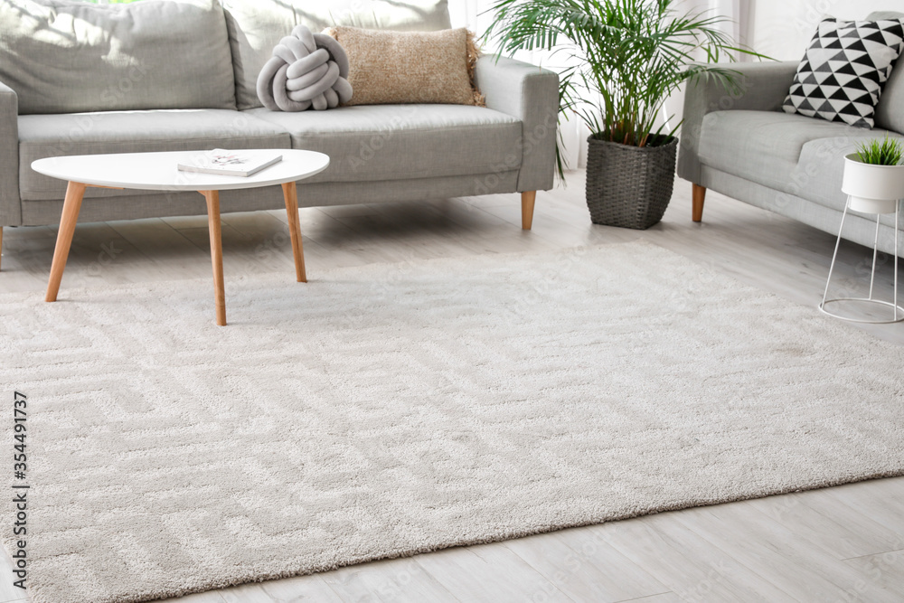 © Pixel-Shot - Stylish interior of living room with carpet and sofas © Pixel-Shot - Stylish interior of living room with carpet and sofas