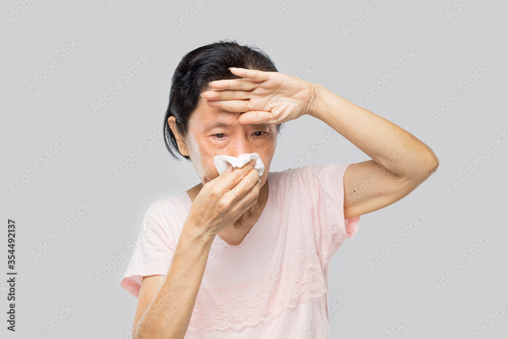 old asian woman feel have fever and sick old asian woman feel have fever and sick
