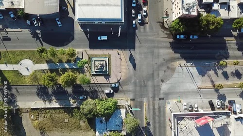 aerial view with drone of an important street of a city appreciating cars, cars and motorcycles, as well as a linear park. photo