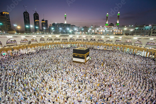 Muslim pilgrims from all around the world doing tawaf, praying around the kabah in Masjidil Haram, Mecca Saudi Arabia, during hajj and umra.