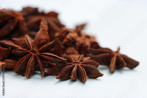 Star anise spice fruits and seeds isolated on white background closeup   © Pravruti