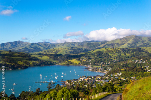 Akaroa scenic view, lookout point from a hill, Banks peninsula, South Island, New Zealand, right before sunset