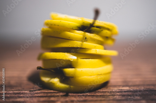 plant-based food, yellow apples cut into stacked slices