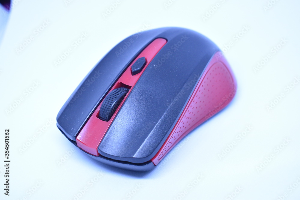Black and red Wireless computer mouse on white background Black and red Wireless computer mouse on white background