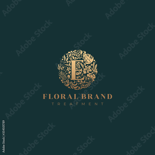 Letter E golden luxurious circle floral decorative logo