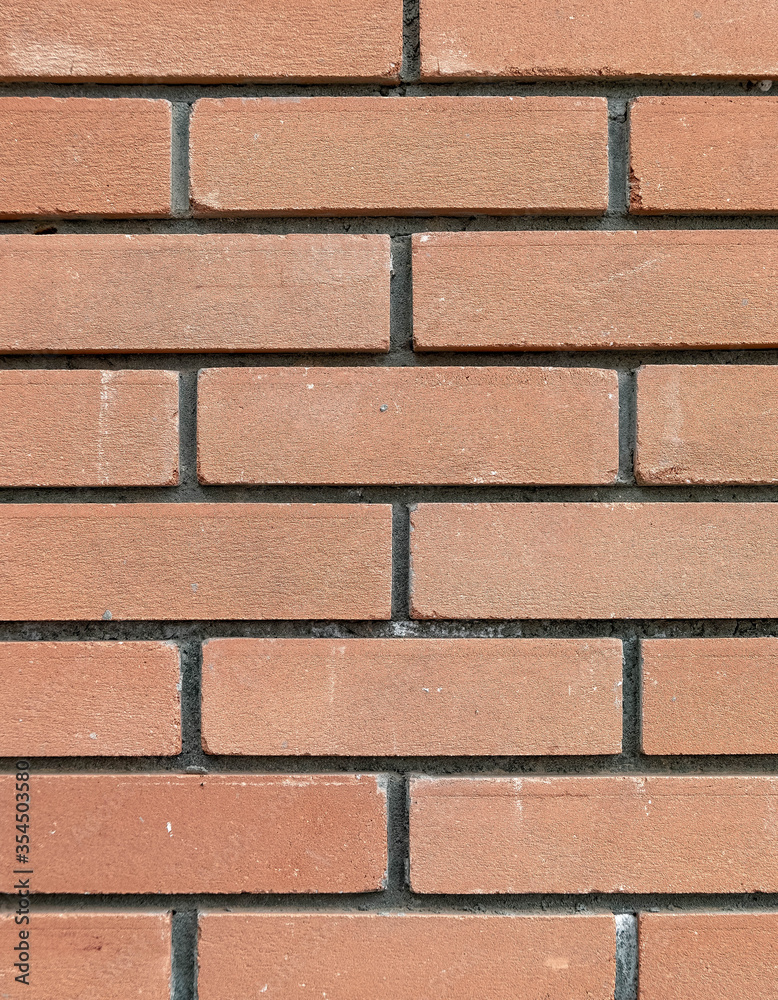 Obraz premium reddish brown new brick wall seamless pattern background