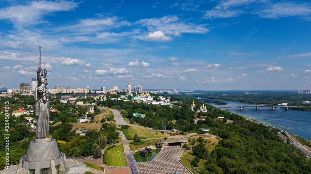 Aerial drone view of Kyiv city hills and parks from above, Kiev cityscape and skyline in spring, Ukraine
