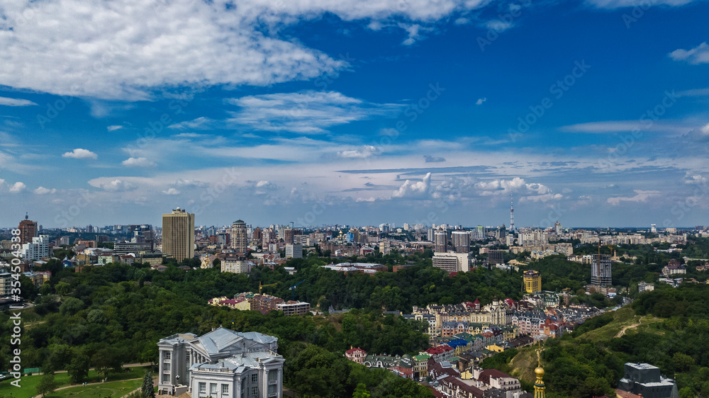 Fototapeta premium Aerial top view of Kyiv cityscape, Podol historical district skyline from above, city of Kiev, Ukraine 