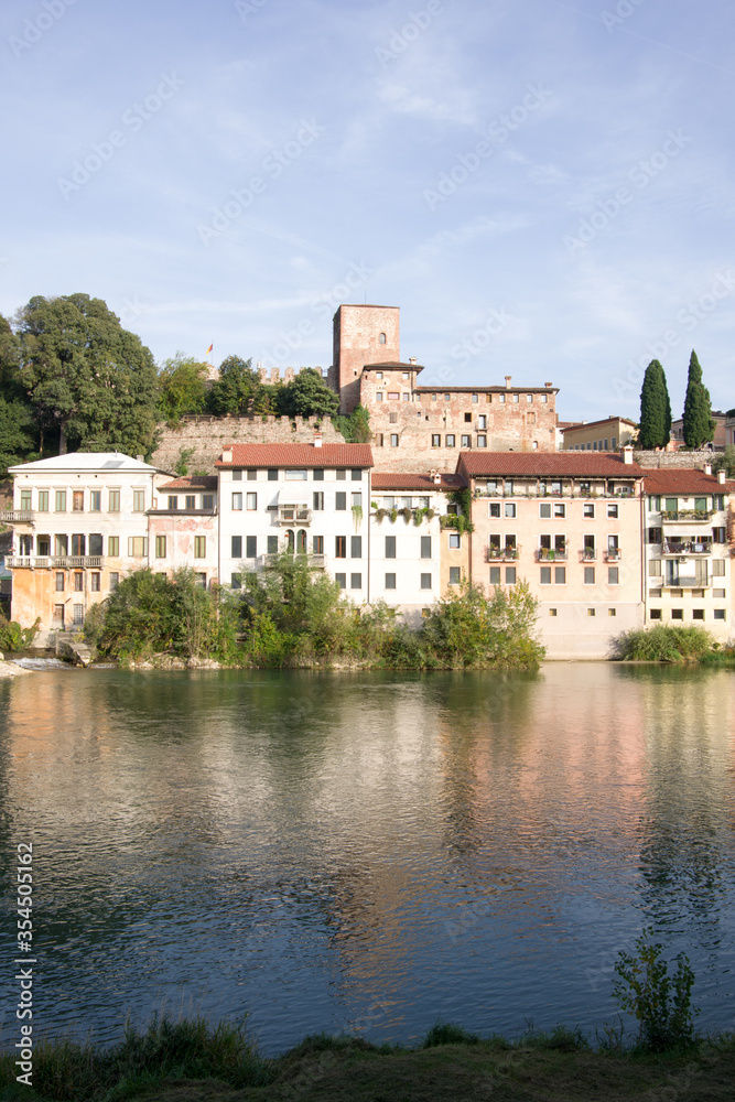Bassano del Grappa, Italy, 10/22/2019 , view of the buildings on the east side of brenta river in Bassano del grappa.