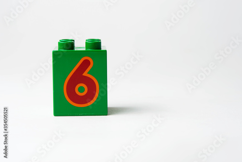 the number six written on the block from the children's constructor