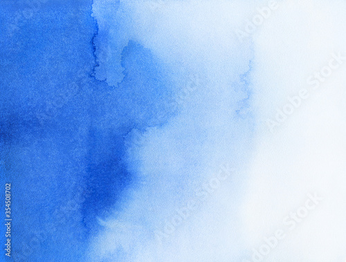 Hand painted blue indigo watercolor texture background.  © smotrivnebo