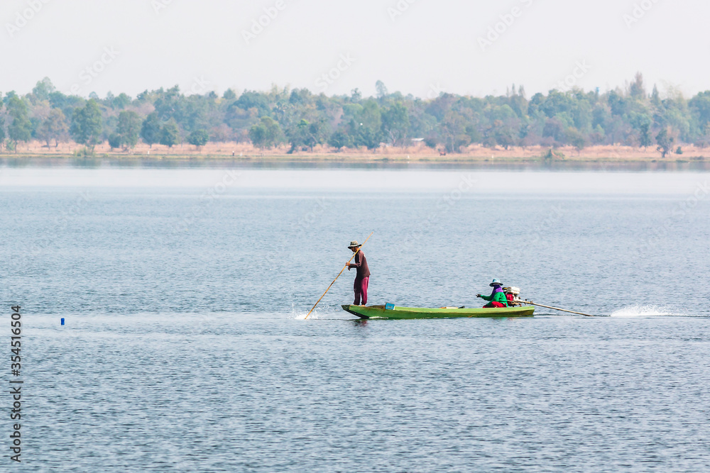 Naklejka premium Villagers fishing in Nong Han, Sakon Nakhon, Thailand