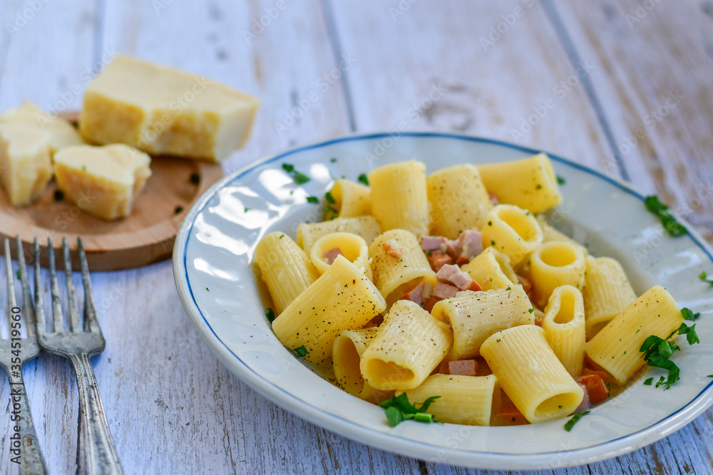 Fresh pasta rigatoni alla carbonara with cream sauce , egg, parmesan cheese ,olive oil and black pepper) Fresh pasta rigatoni alla carbonara with cream sauce , egg, parmesan cheese ,olive oil and black pepper)