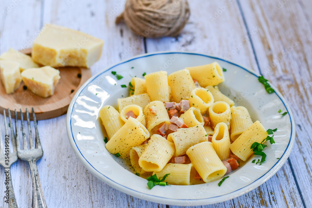 Home made italian carbonara pasta with parmesan cheese Home made italian carbonara pasta with parmesan cheese