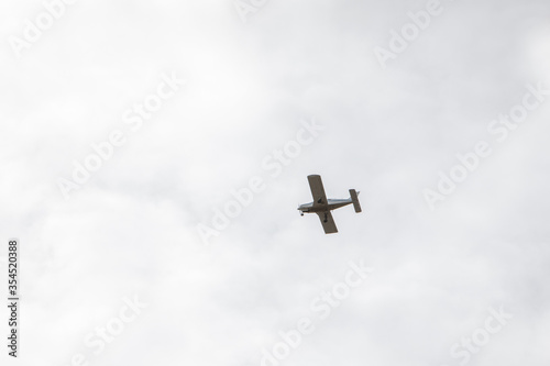 small airplane in sky