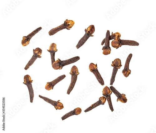 dry cloves on white background. top view