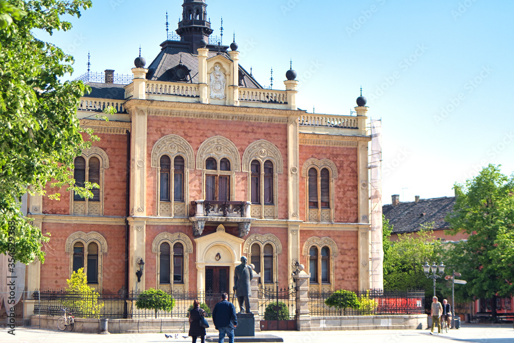 Obraz premium Facade of old historic building in the pedestrian center of tourist city Novi Sad, Serbia